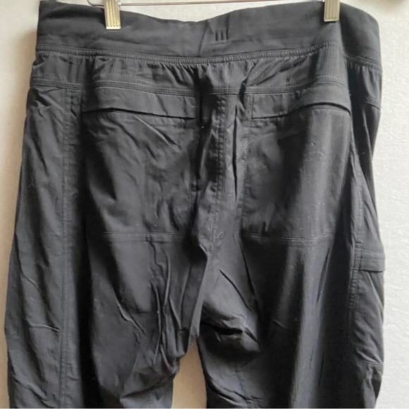 Lululemon Athletica studio Sewell track pants Sz 34”/ Sz L - Picture 5 of 12